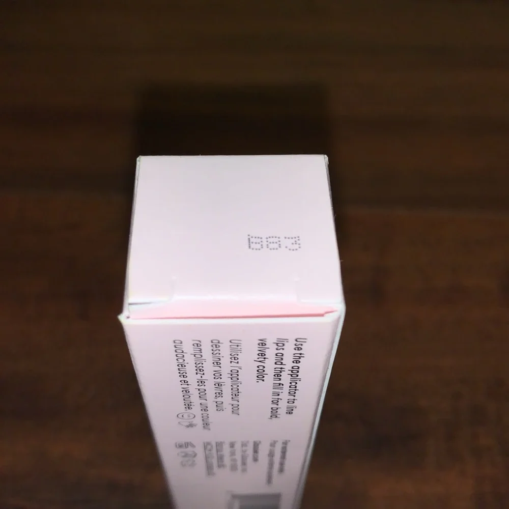 glossier suit